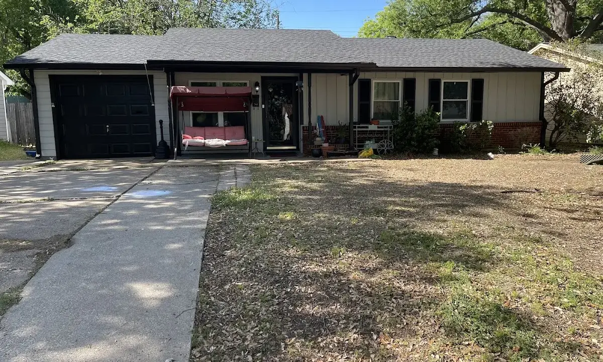 Hail Damage Roof Repair crew at work on a residential roof in North Laurel